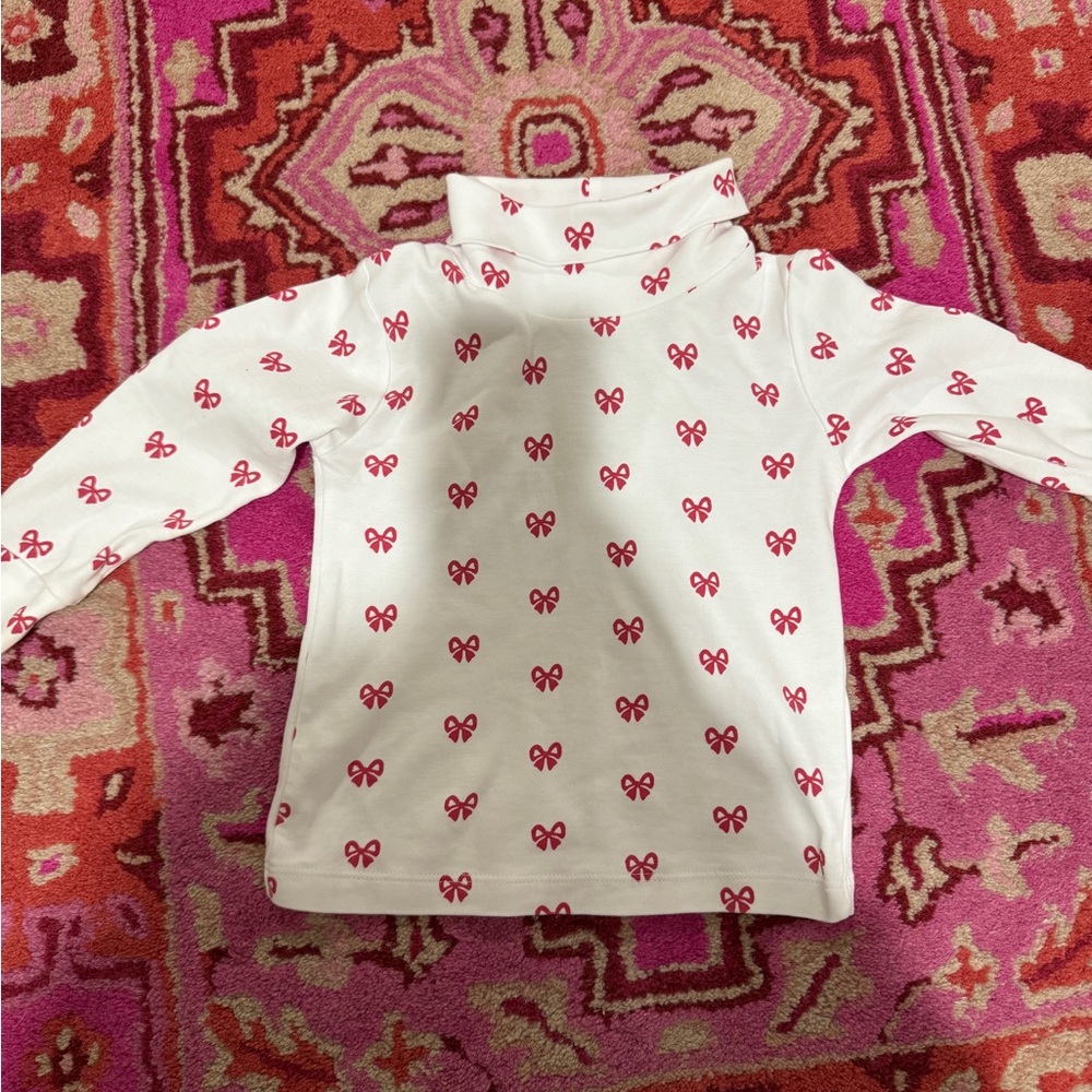 Adorable bow turtleneck